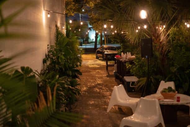 An alleyway at nighttime set up for a party