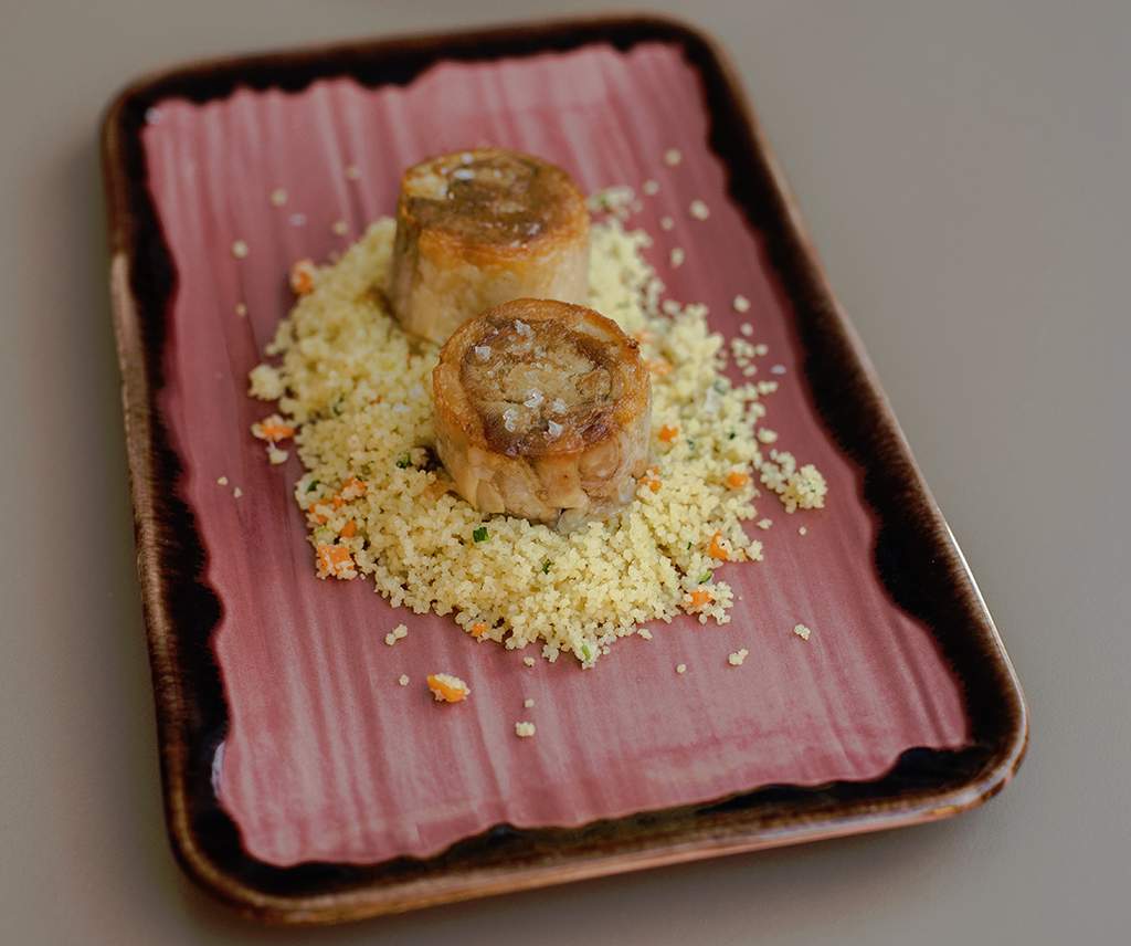 Medaillons von der Schweinebacke mit Couscous im Uvedoble Málaga Gourmet Tapas Gericht